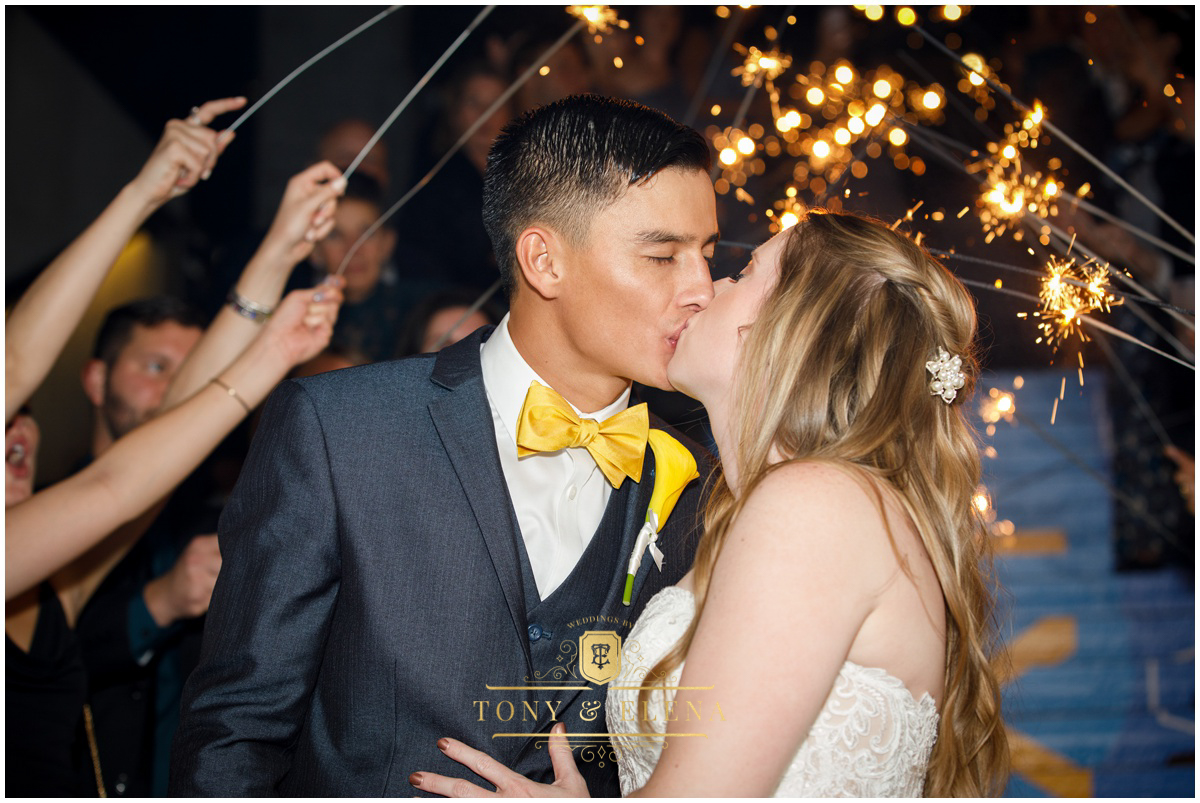 w austin wedding photographer bride groom exit kiss sparklers