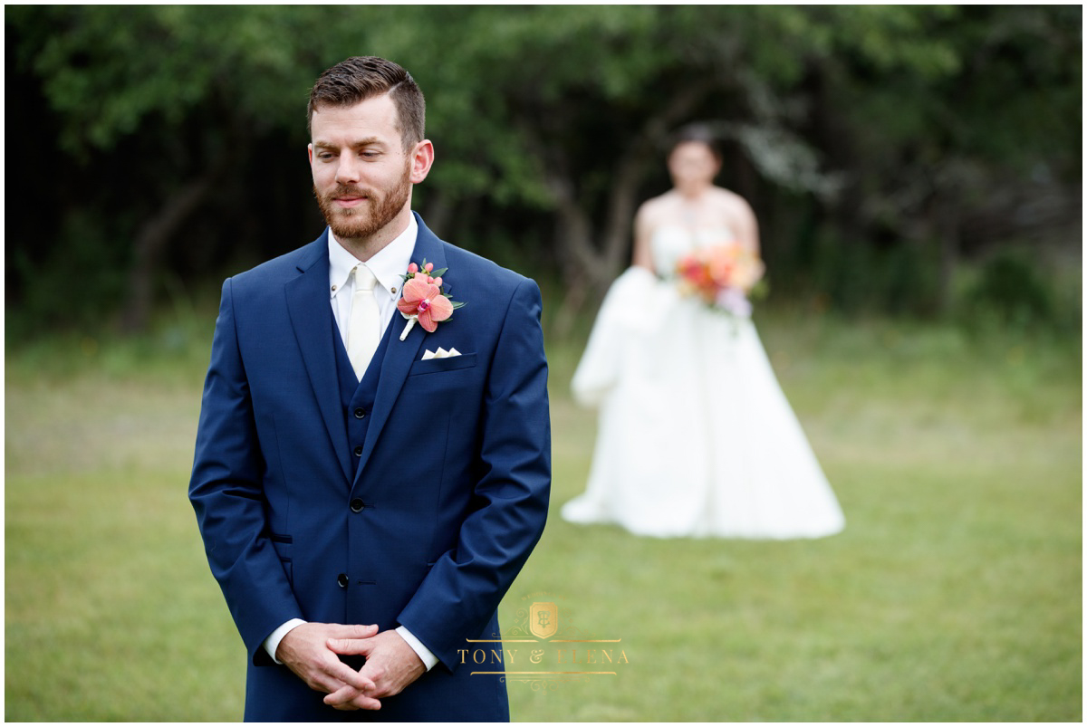 best wedding photographer in austin terrace club bride groom first look groom in focus