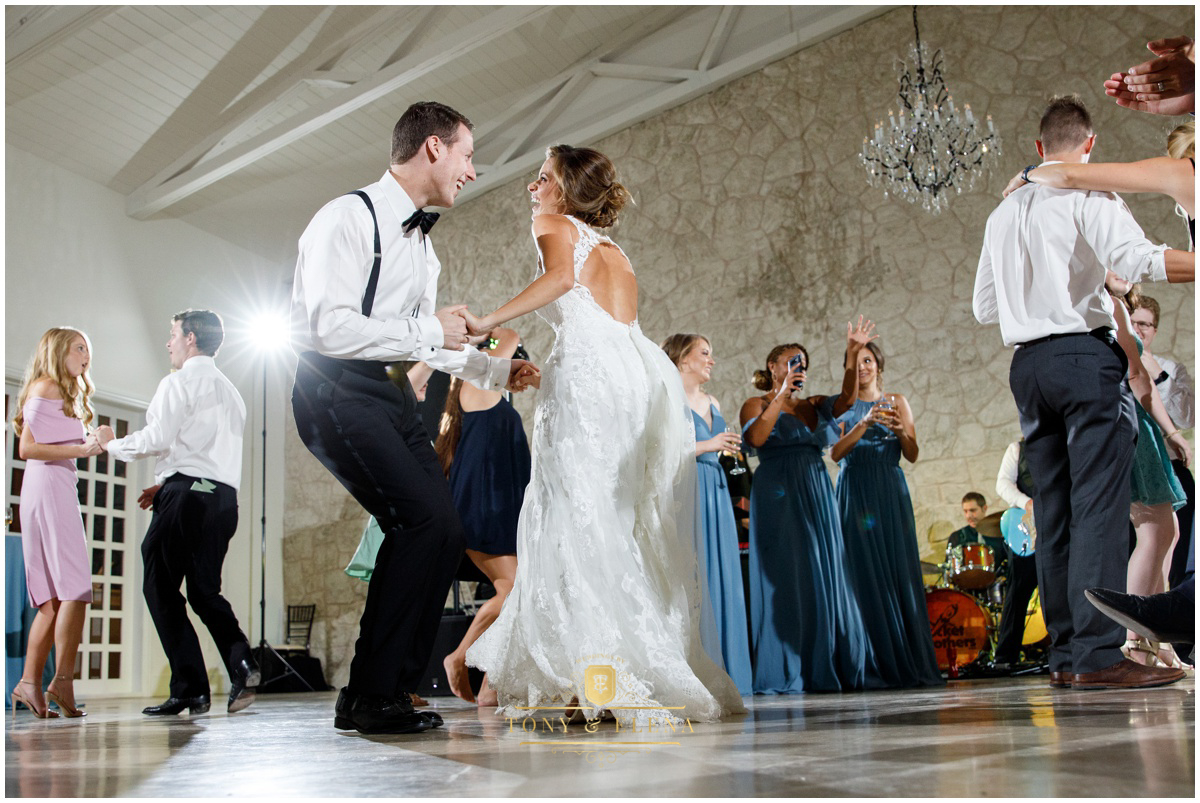 austin wedding photographer ivory oak bride groom celebrating dancing