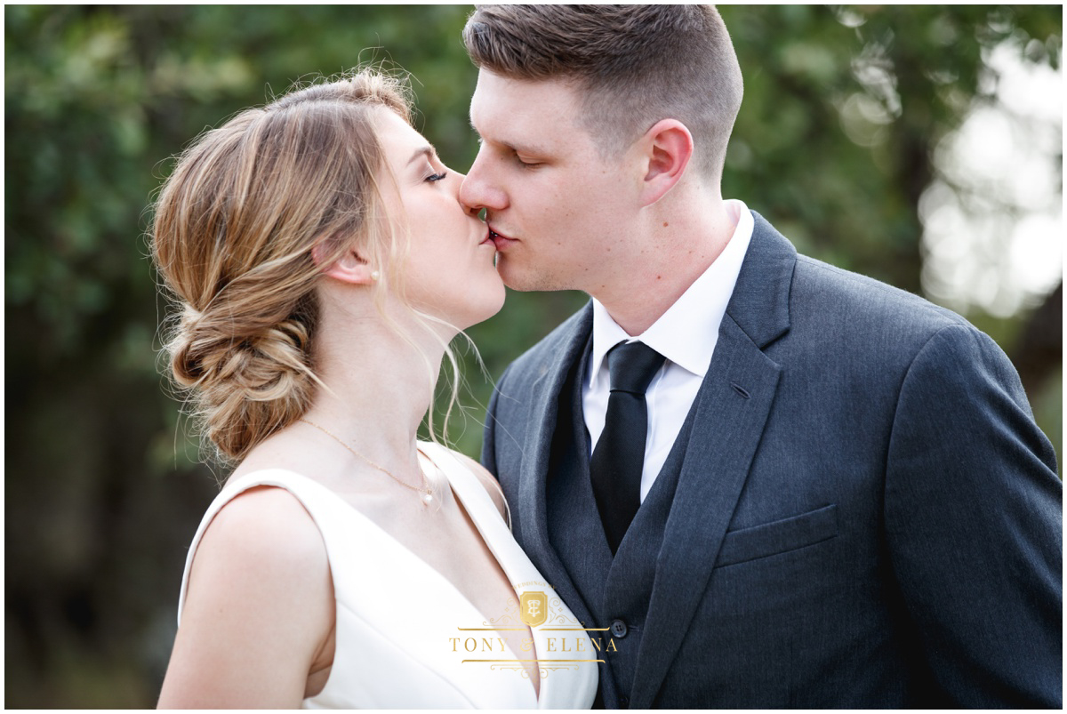 Austin wedding photographer terrace club bride groom close up kiss