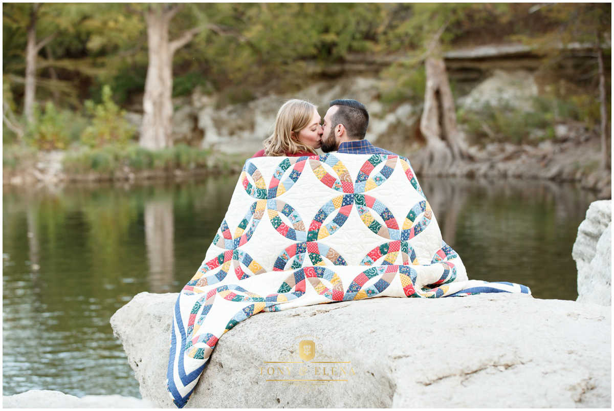 austin engagement session wedding photographer bride groom kissing grandma blanket