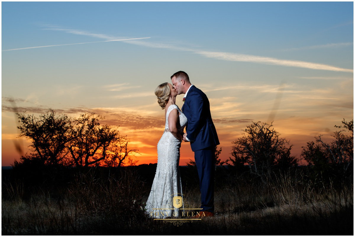 austin wedding photographer terrace club wedding photographer bride and groom kissing sunset