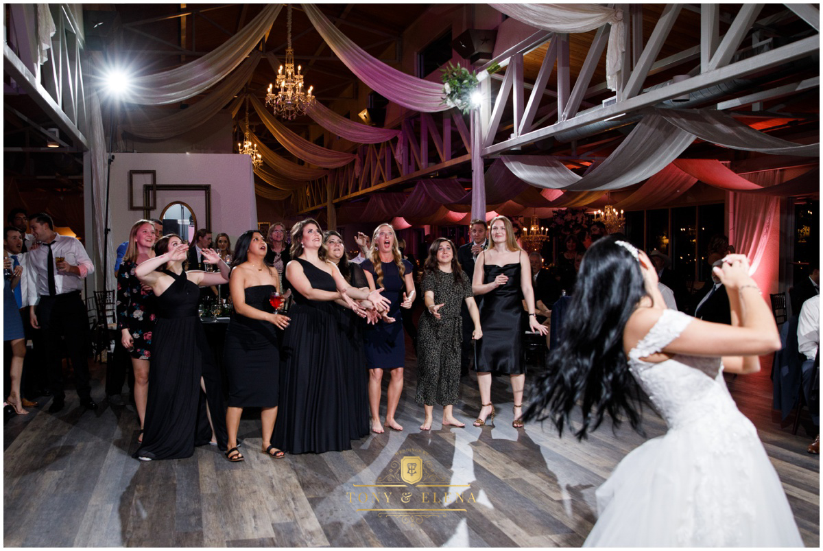 terrace-club-wedding-austin-wedding-photographer-bride-throws-bouquet