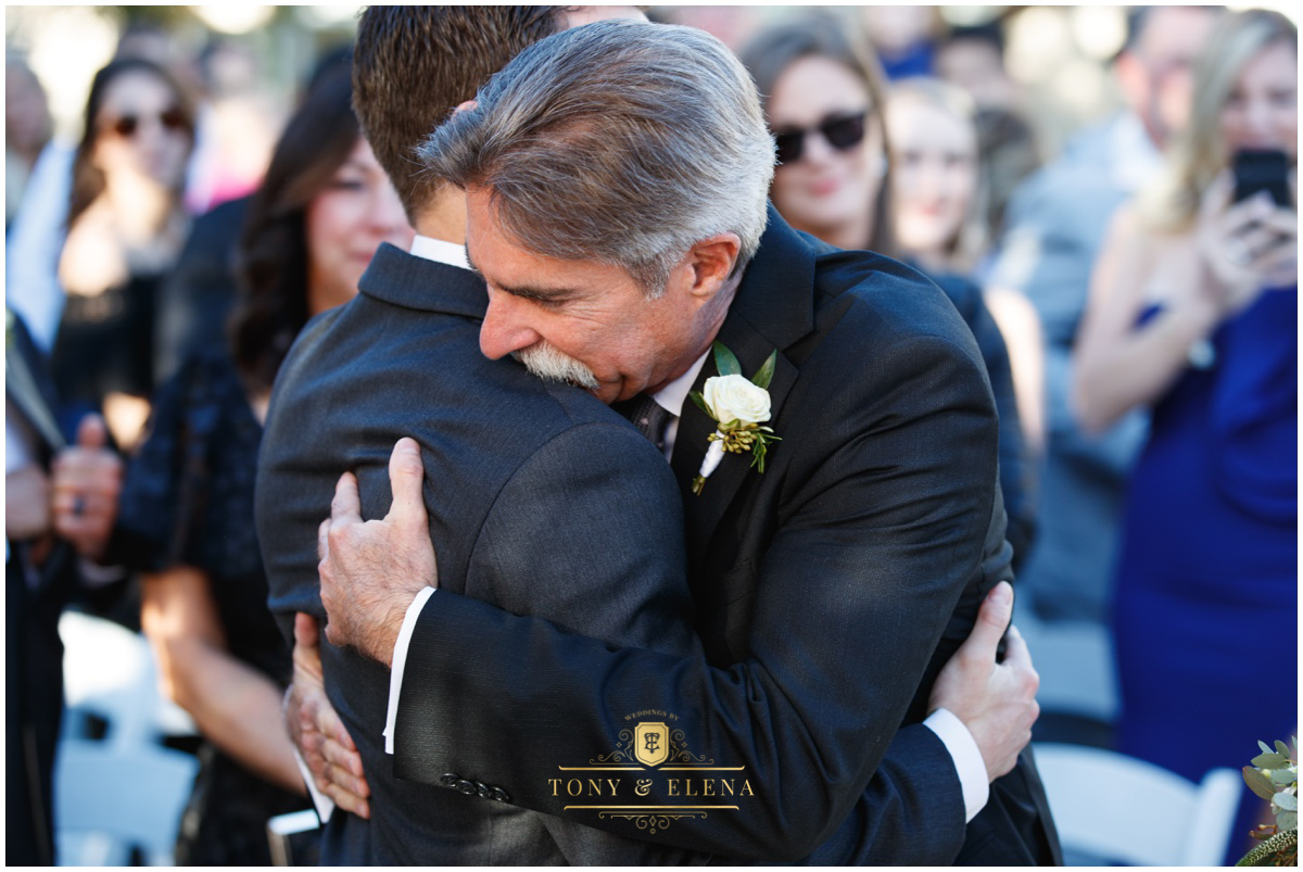 terrace-club-wedding-austin-wedding-photographer-dad-hugging-groom